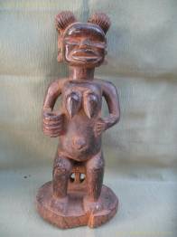 MATERNIDAD DESNUDA SENTADA